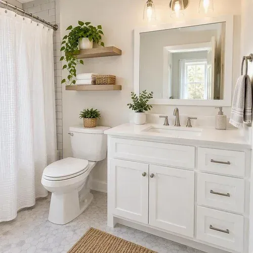 Crisp white refinished bathroom vanity in a bright Lincoln bathroom