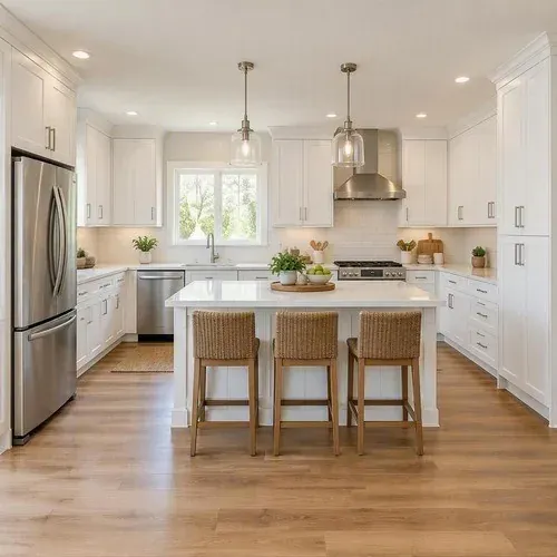 Refaced kitchen with new white shaker cabinet doors on the original boxes in Lincoln, NE
